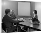 Three executive businessmen conference table audiovisual presentation by Anonymous