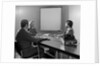 Three executive businessmen conference table audiovisual presentation by Anonymous
