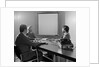 Three executive businessmen conference table audiovisual presentation by Anonymous