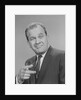 Portrait man pointing wearing suit tie smiling by Anonymous