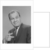 Portrait man pointing wearing suit tie smiling by Anonymous