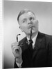 Serious thinking thoughtful older man holding eyeglasses to chin by Anonymous