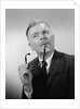 Serious thinking thoughtful older man holding eyeglasses to chin by Anonymous