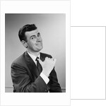 Business man smiling giving thumbs up sign pointing to himself by Anonymous