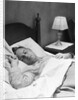 Man sleeping asleep in bedroom by Anonymous