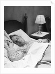 Man sleeping asleep in bedroom by Anonymous