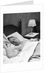 Man sleeping asleep in bedroom by Anonymous