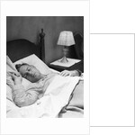 Man sleeping asleep in bedroom by Anonymous