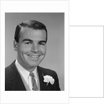 Smiling young man formal attire boutonniere in lapel bridegroom groom by Anonymous