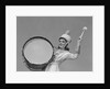Smiling young woman band uniform carrying playing big drum by Anonymous
