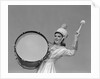 Smiling young woman band uniform carrying playing big drum by Anonymous