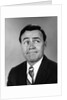 Businessman making funny face looking to the side by Anonymous