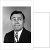 Businessman making funny face looking to the side by Anonymous