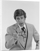 Businessman serious expression pointing with eyeglasses by Anonymous