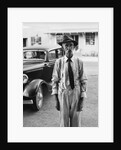 Portrait of old man wearing hat glasses tie & suspenders car in background by Anonymous