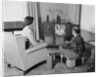 Couple husband wife watching console television in living room by Anonymous