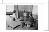 Couple husband wife watching console television in living room by Anonymous