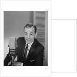 Man speaking into microphone radio tv announcer broadcaster by Anonymous