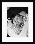 Man asleep sleeping in bed wearing pajamas by Anonymous