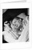 Man asleep sleeping in bed wearing pajamas by Anonymous