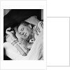 Man asleep sleeping in bed wearing pajamas by Anonymous