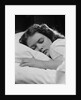Girl sleeping head on pillow by Anonymous