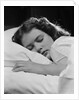 Girl sleeping head on pillow by Anonymous