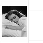 Girl sleeping head on pillow by Anonymous