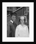 Graduation couple in cap and gown by Anonymous