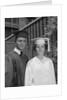 Graduation couple in cap and gown by Anonymous