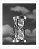 Hourglass against background of clouds by Anonymous