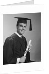 Smiling man holding diploma wearing graduation robes by Anonymous