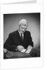 Man writing check from checkbook by Anonymous