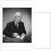Man writing check from checkbook by Anonymous