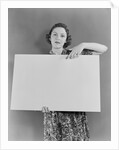 Woman holding blank poster sign hand pointing from top by Anonymous