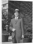 Portrait businessman wearing hat suit holding briefcase by Anonymous