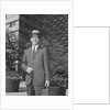 Portrait businessman wearing hat suit holding briefcase by Anonymous