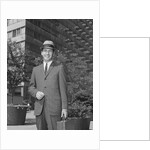 Portrait businessman wearing hat suit holding briefcase by Anonymous