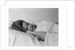Woman sleeping bed by Anonymous