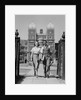 College aged student couple walking through campus gates university of pennsylvania by Anonymous