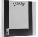 Office door glass panel with sign loans by Anonymous