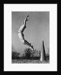 Male cheerleader jumping cheering megaphone on ground by Anonymous