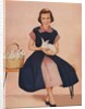 Girl holding rabbit by Anonymous