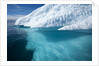 Iceberg above and below water in Disko Bay in Greenland by Anonymous
