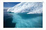Iceberg above and below water in Disko Bay in Greenland by Anonymous
