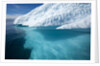 Iceberg above and below water in Disko Bay in Greenland by Anonymous