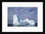 Arched iceberg in Disko Bay in Greenland by Anonymous