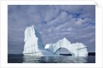 Arched iceberg in Disko Bay in Greenland by Anonymous