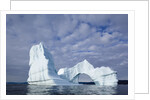 Arched iceberg in Disko Bay in Greenland by Anonymous