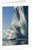 Calving iceberg in Disko Bay in Greenland by Anonymous